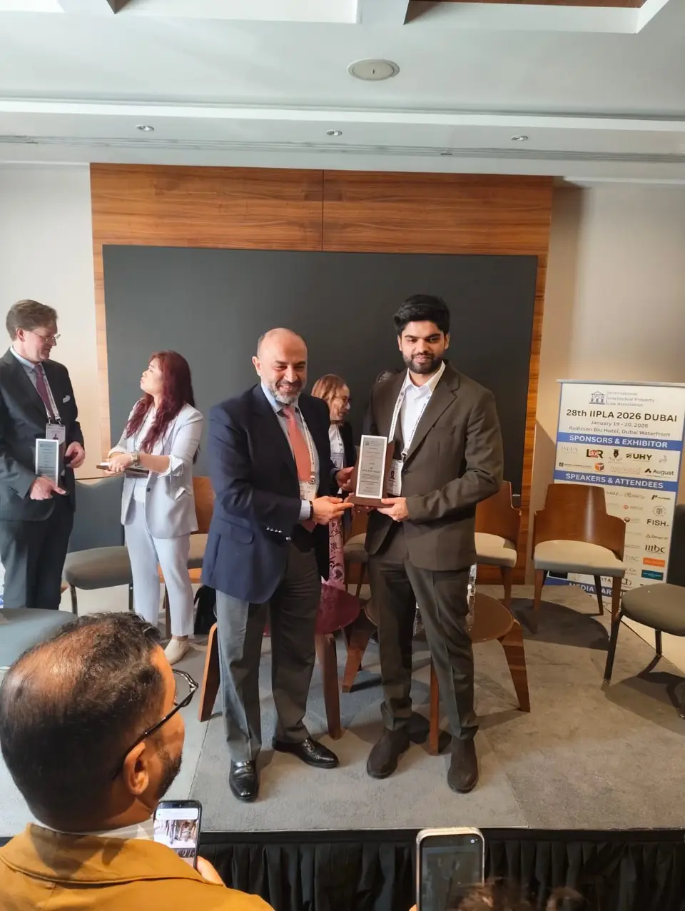 Co-founders Rajatpreet and Zaman with IIPLA trophies