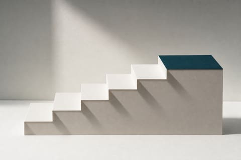 White paper steps with one teal step